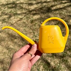 yellow vintage watering can